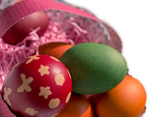 Easter eggs in basket on white  background