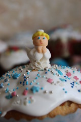 Easter, sweet background with  little angel on Easter cake