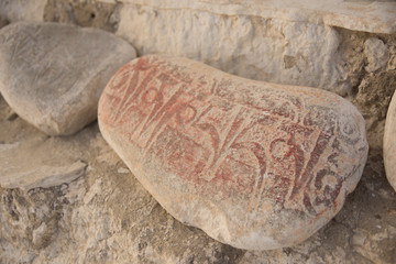 buddhist mantras carved in stone