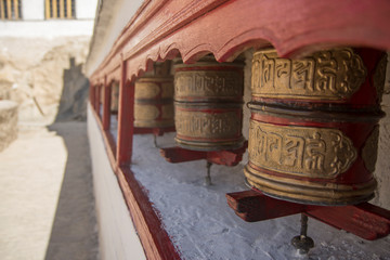 buddhist prayer wheels in leh, ladakh