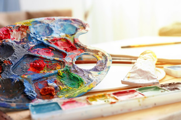 Set of artist's supplies on table