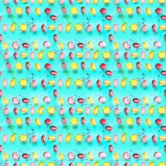 Abstract seamless pattern with flying colored macaroons, holiday concept.