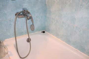 shower faucet in modern bathroom