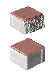Set of paving stones made of concrete isolated on white background. One of the tiles is broken to reveal a top layer of colored cement.