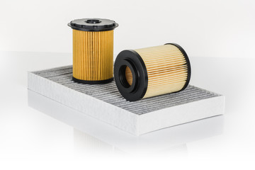 Various car or automotive parts on white background