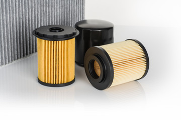 Various car or automotive parts on white background