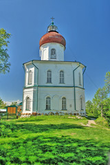 Fototapeta na wymiar Voznesenskaya church-lighthouse (Ascension church) on Sekirnaya Mount of Bolshoy Solovetsky Island, Solovetsky Archipelago, Russia