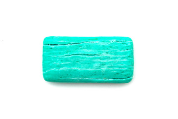 blue dry toilet soap with cracks on a white background