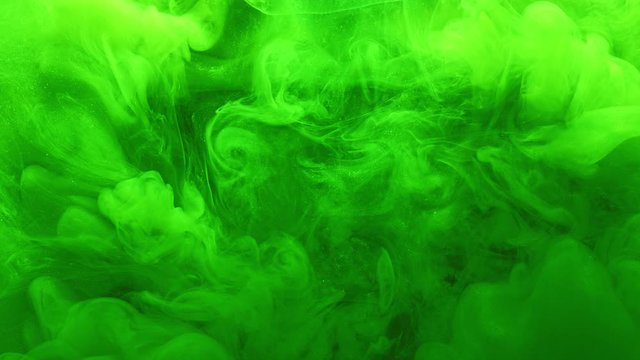 Steam motion. Toxic air. Glitter neon green haze flow effect for video editing.