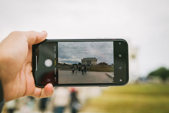 Lincoln Memorial and mirror reflection in phone