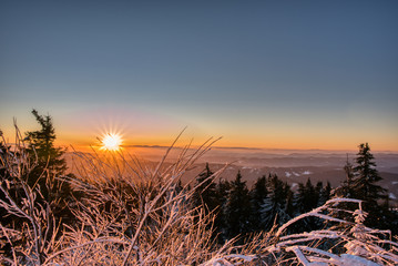 Colorful winter sunrise in mountains. beskydy czech