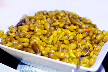 Green Chili Papers in a Bow .Appetizer in a Restaurant 