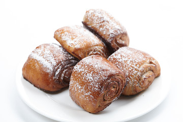 fresh buns on the white plate