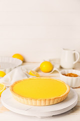 Tasty homemade lemon pie on table