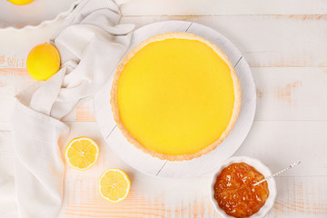 Tasty homemade lemon pie on table
