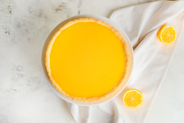 Tasty homemade lemon pie on table