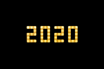 Yellow neon glowing led 2020 sign on black