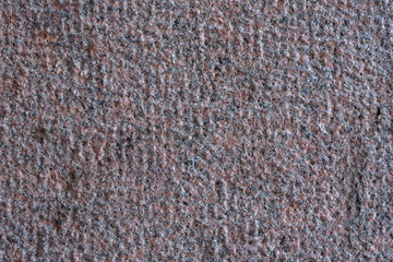 Roughly processed granite slab. Top view. Backgrounds and textures