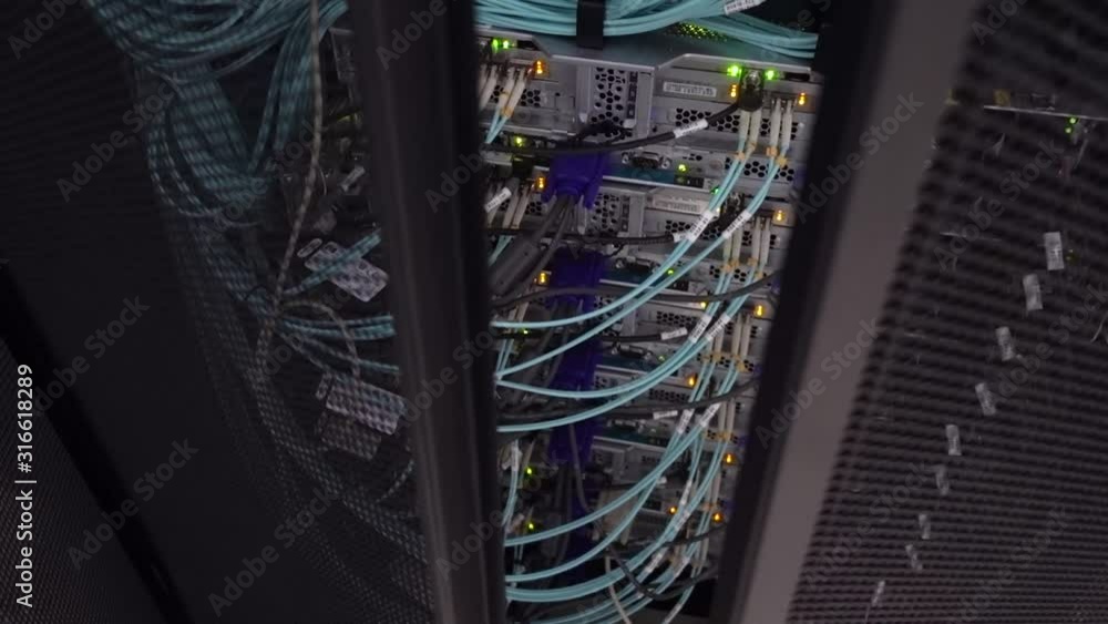 Poster rack server hardware in the data center. open door server rack.
