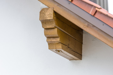 Detail of the beam roof construction of a finished residential house covered with roof slabs.