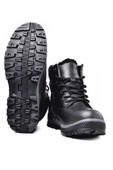 Winter men’s black leather boots on a white background, hiking shoes, practical off-road shoes,...
