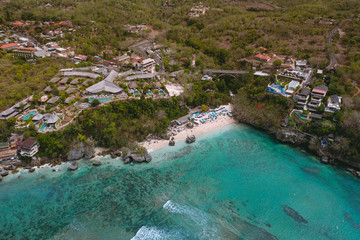 Most beautiful beach in Bali Padang Padang Beach with crystal clear azure water aerial view from drone
