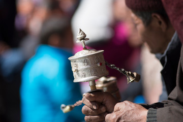 Buddhist prayer wheel spining