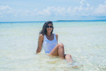 Young indian woman happy in the beach