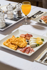 Ham and eggs breakfast served in restaurant