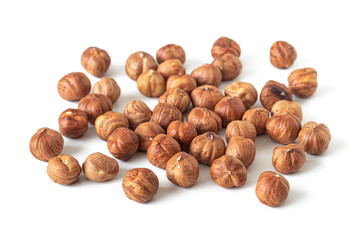 Handful of peeled hazelnuts with a textured skin