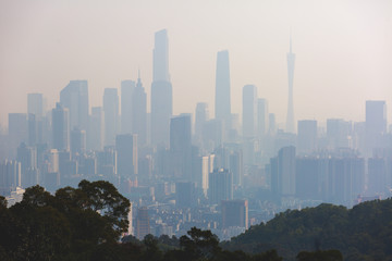Naklejka premium View of Guangzhou city with Zhujiang New Town from White Cloud Mountain, Baiyun Mountain, Guandong, China, sunny summer day