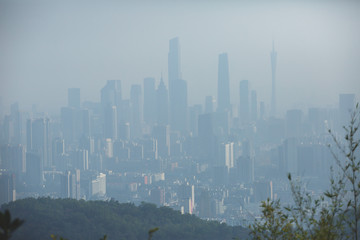 View of Guangzhou city with Zhujiang New Town from White Cloud Mountain, Baiyun Mountain, Guandong, China, sunny summer day