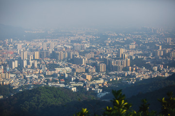 Fototapeta premium View of Guangzhou city with Zhujiang New Town from White Cloud Mountain, Baiyun Mountain, Guandong, China, sunny summer day