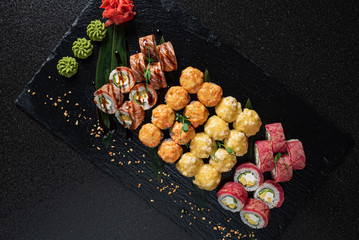 sushi on the black background