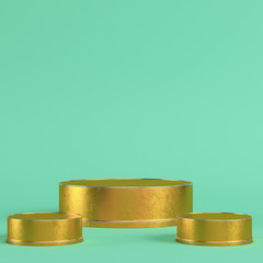 Golden cylindrical display stands on bright green background in pastel colors. Minimalism concept