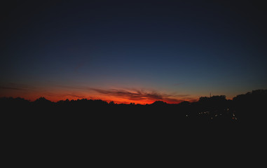 Beautiful sunset over the silhouette skyline of Mannheim