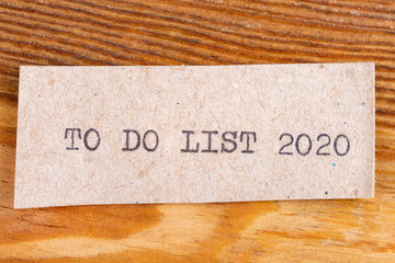 The word "to do list 2020" typed. The inscription on a gray sheet of pappier. " typed. The inscription on a gray sheet of pappier.