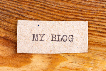 The word "my blog" typed. The inscription on a gray sheet of pappier.