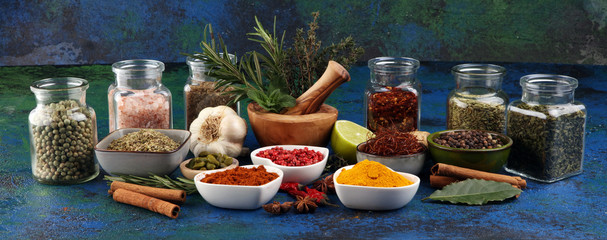 Spices and herbs on table. Food and cuisine ingredients with pepper