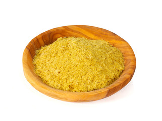 nutritional yeast flakes isolated on white background