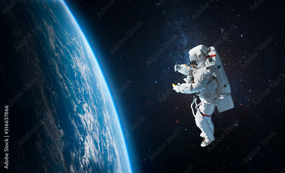 Aufkleber Astronaut in the outer space over the planet Earth. Abstract wallpaper. Spaceman. Elements of this image furnished by NASA