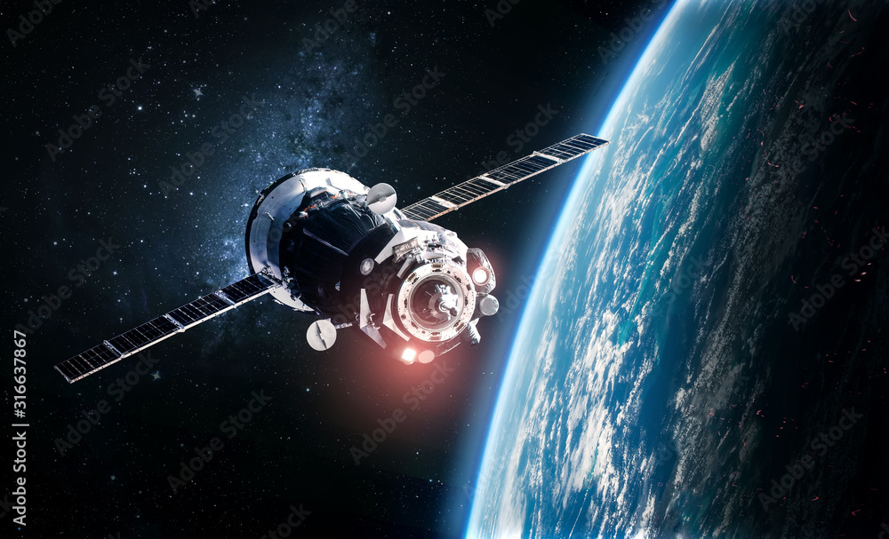 Poster cargo space ship on orbit of the earth planet. milky way on background. elements of this image furni