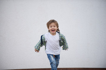 Happy boy runs around the stage. Blurred image - 316641464