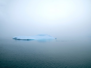 Naklejka na ściany i meble Arctic glacier in arctic ocean, greenland
