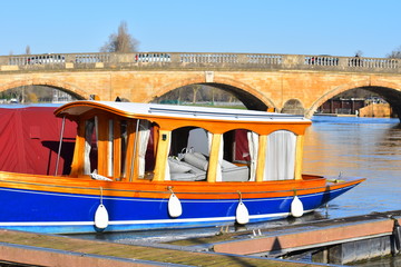 Narrow old fashioned boat. Henley Royal Regatta 2020 takes place from Wednesday 1st to Sunday 5th July for five days. Popular Oxfordshire event attracts thousands of visitors annually to river Thames