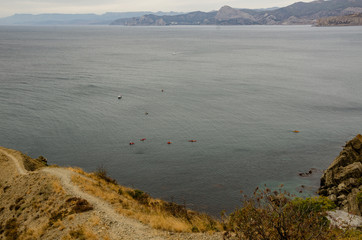 Mountain landscape. Mountain trail off the coast. Travel and adventure.