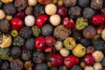 Closeup of mixed pepper background. Top view.