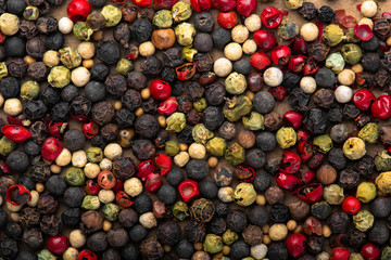 Closeup of mixed pepper background. Top view.