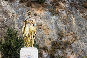 a wide shoot from golden virgin mary statue - detailed and nice looking