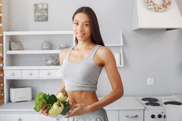 Healthy eating. Dieting and people concept. Brunette with a vegetable.